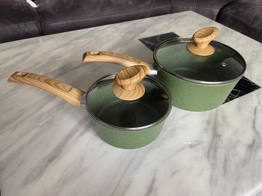  — Cooking pans