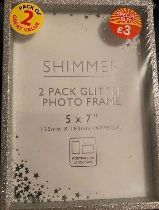  — Silver glitter photo frames