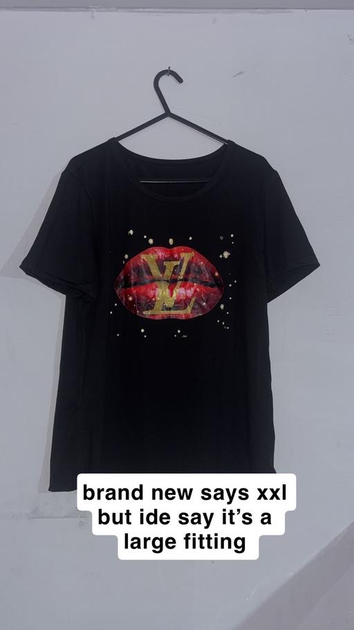  — Size large women’s T-shirt