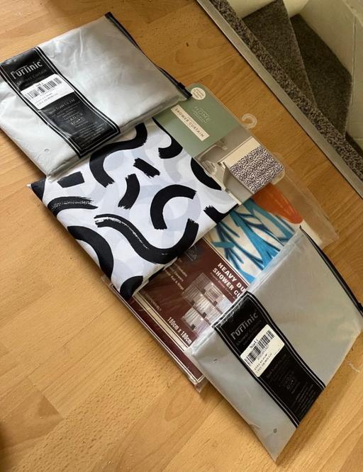  — Shower curtains