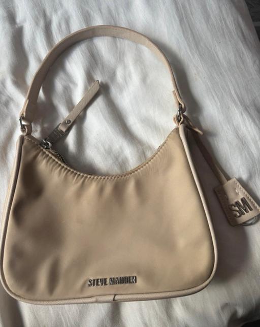  — Handbag