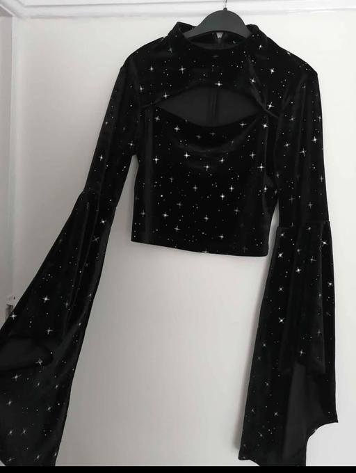  — women's size 10 black top