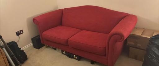  — Laura Ashley burgundy sofa