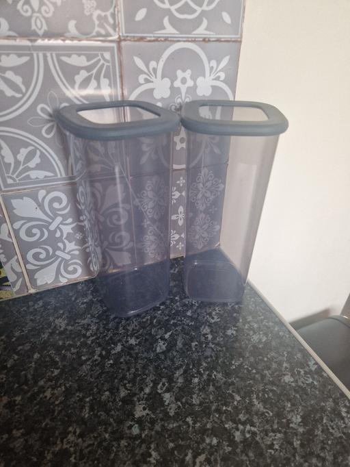  — 2 tall storage tubs