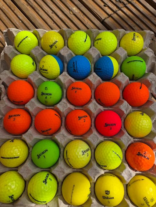  — golf balls