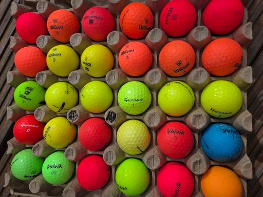  — golf balls