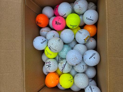 — golf balls
