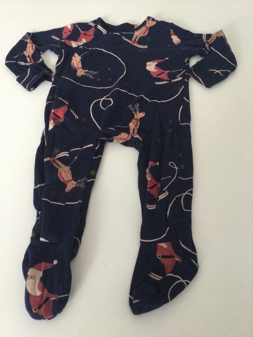  — Xmas sleepsuit age 6/9months