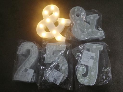  — New light up signs approx 8.5" high