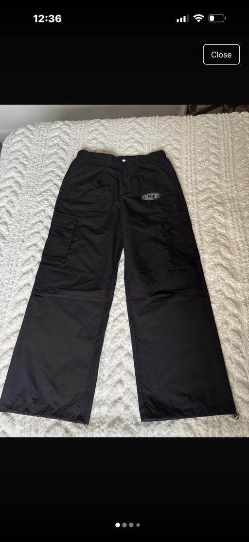  — 1Deluxe cargos