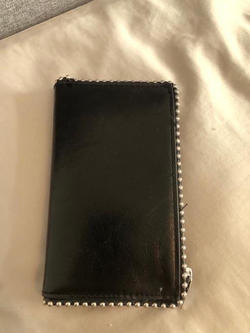  — Purse