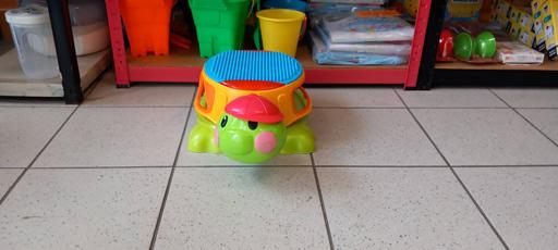 — Peek a blocks build and spill musical turtle