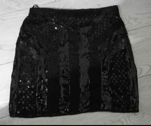  — women's size 12 black sequin skirt