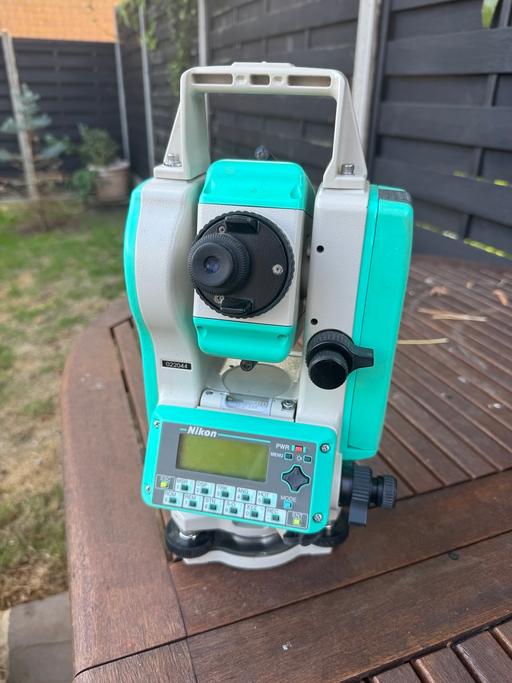  — Nikon DTM 330