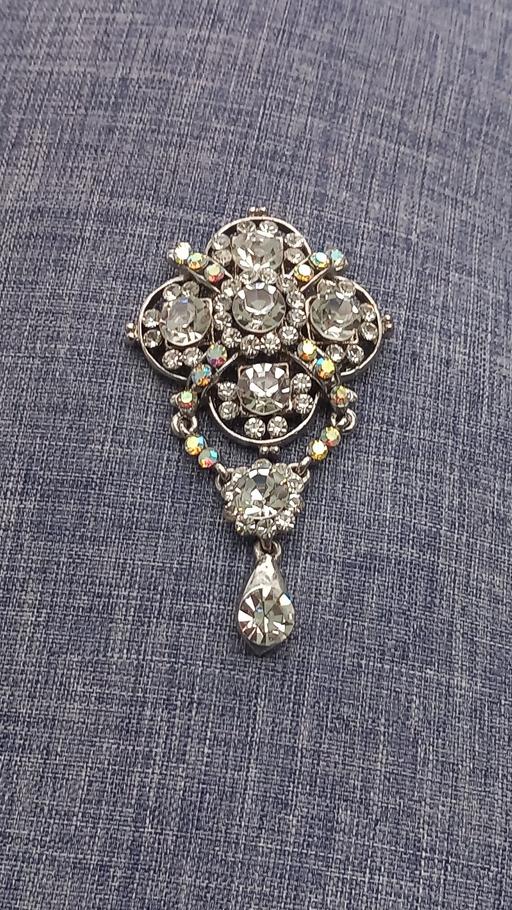  — brooch