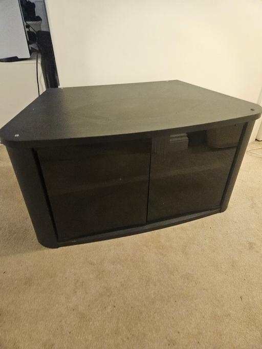  — Black TV unit with glass doors