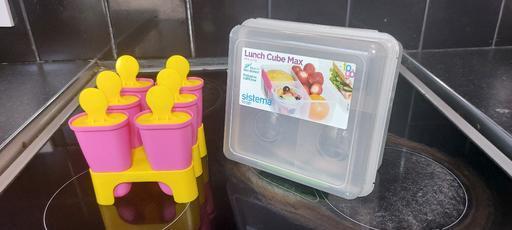  — lunch box and ice lolly  mould .  