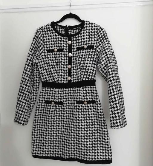  — women's size 10 black and white dress