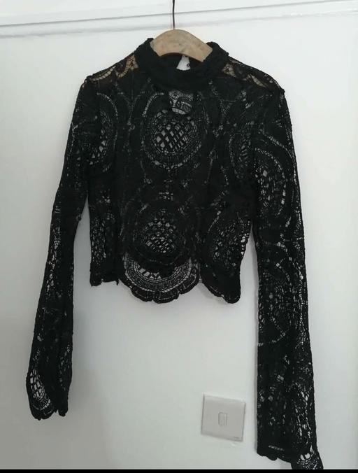  — women's size 10 black top