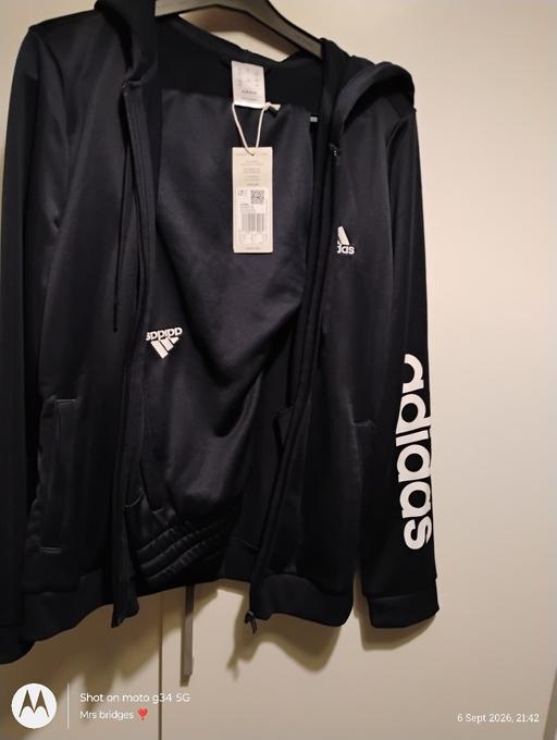  — tracksuit