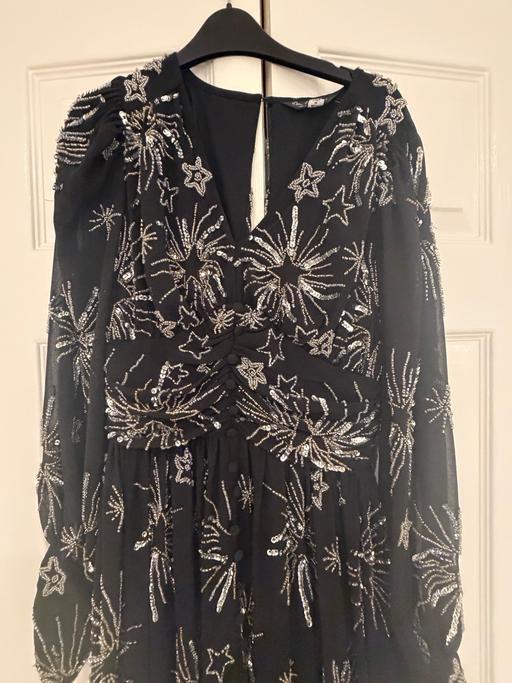  — Dress