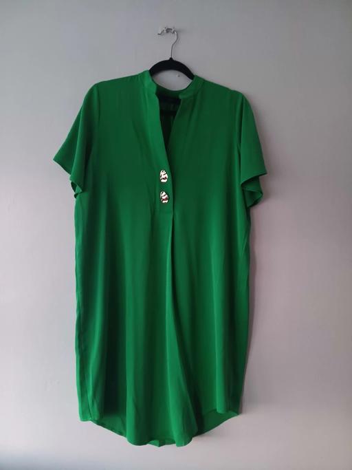  — emerald green tunic