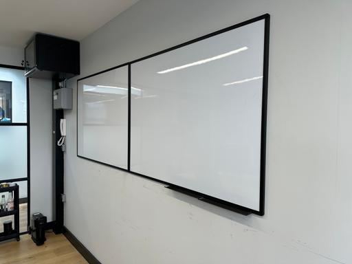  — Large wall mounted whiteboard - two panel