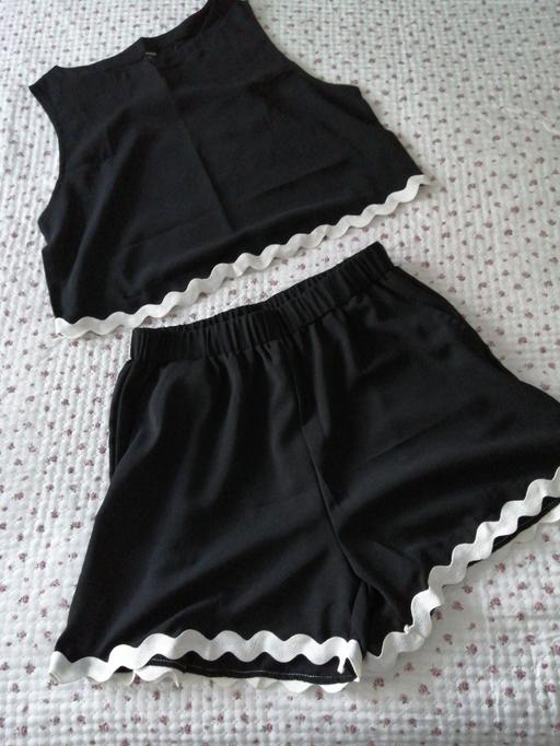  — ladies Top & Shorts size *L*