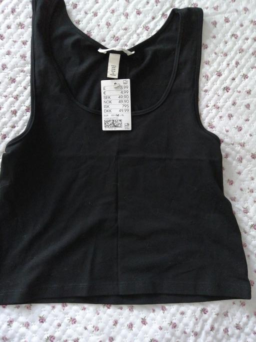  — ladies size *M*