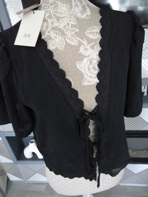  — ladies size *M*