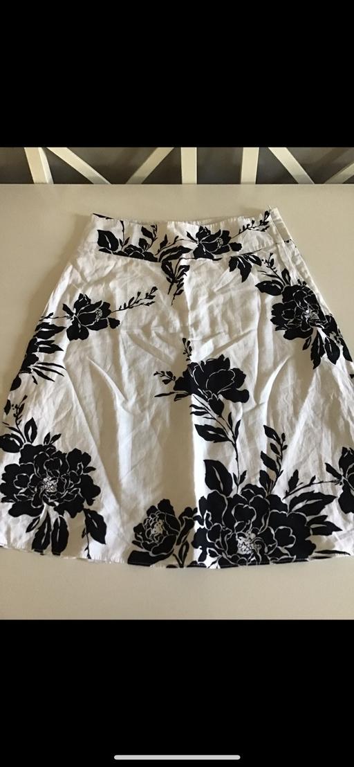  — Black & white floral midi skirt size 10