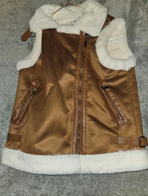  — Fur gilet brown coat