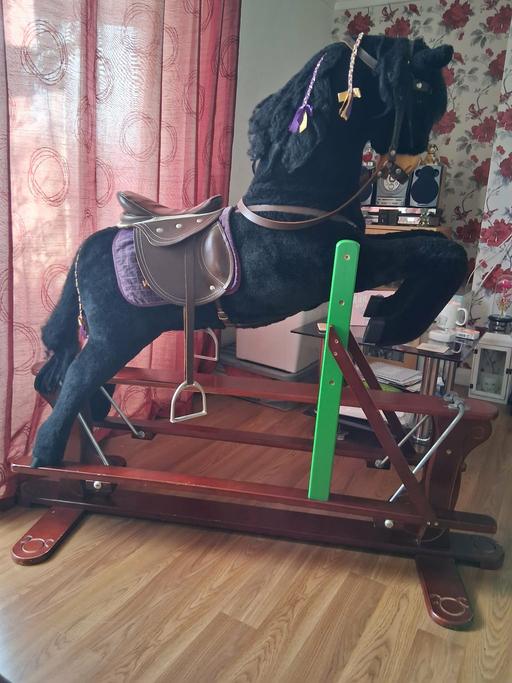  — Title: Glider Rocking Horse