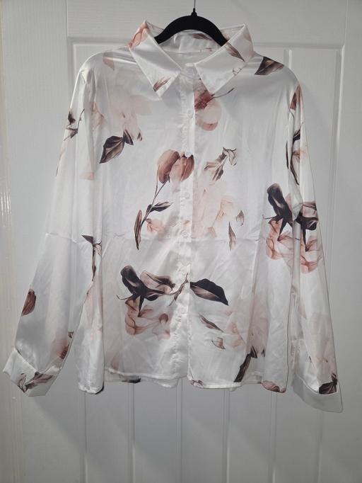  — silky size L shirt.