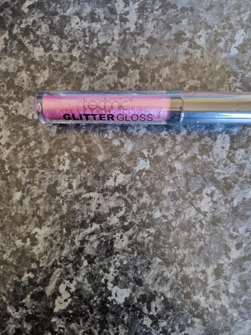  — brand new glitter lipgloss