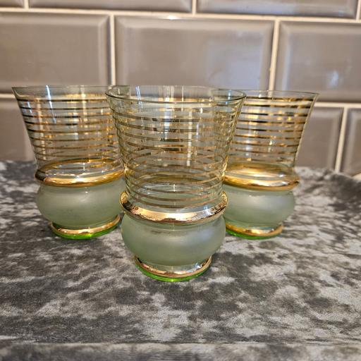  — 3 green and gold glasses