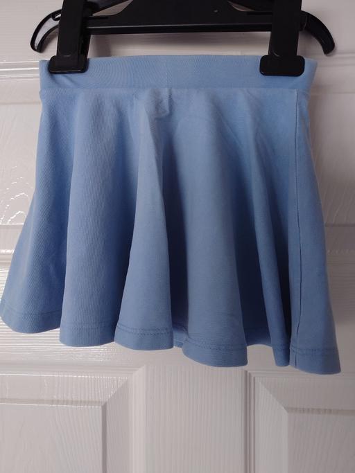 — Girls blue skirt size 12-18 months