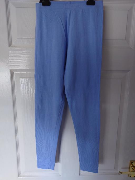  — Girls blue leggings size 11-12 years