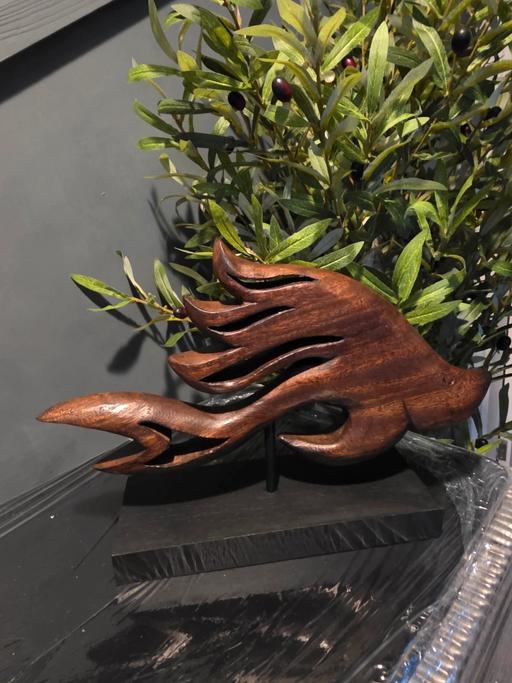  — Fish on a plinth ornament