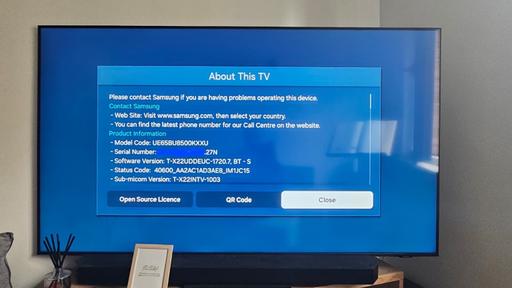  — Samsung 65” 4K TV with sound bar and table