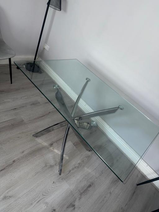  — Glass dining table with chrome legs