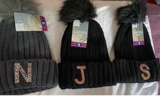  — Knitted hat initial letter S, N, T & J