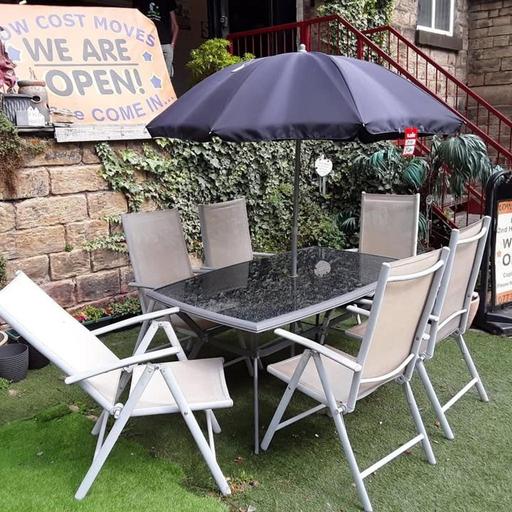  — Large glass garden table/ 6 chairs/ umbrella