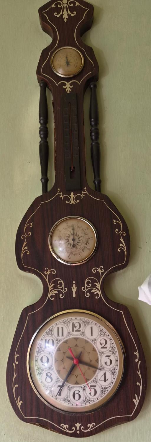  — guitar clock, weather and theometer