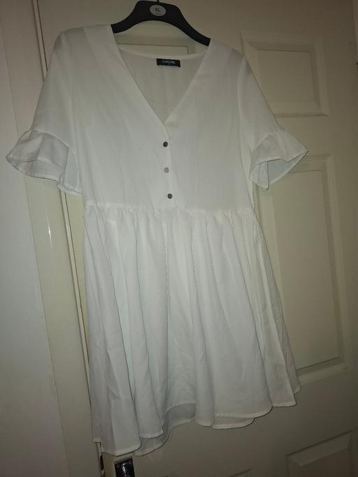 — ladies dress size 12 to 14