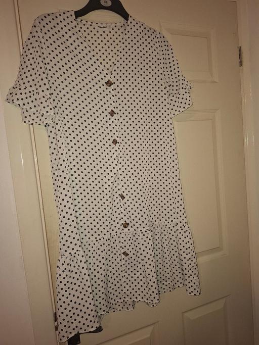  — ladies dress size 14 to 16