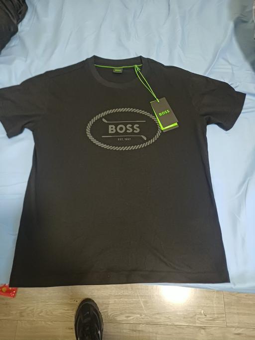  — boss tee