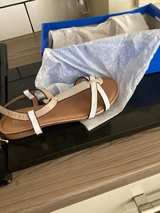  — Brand new in box size 4 sandals