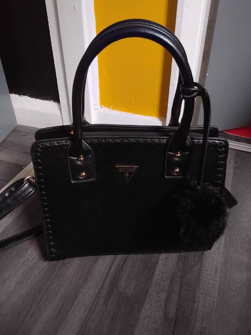  — New Handbag.