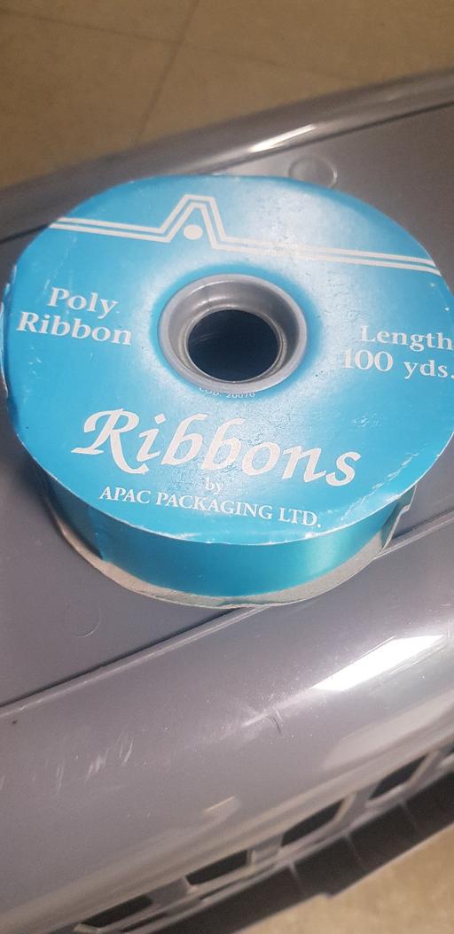  — full new roll of poly ribbon 100yrds